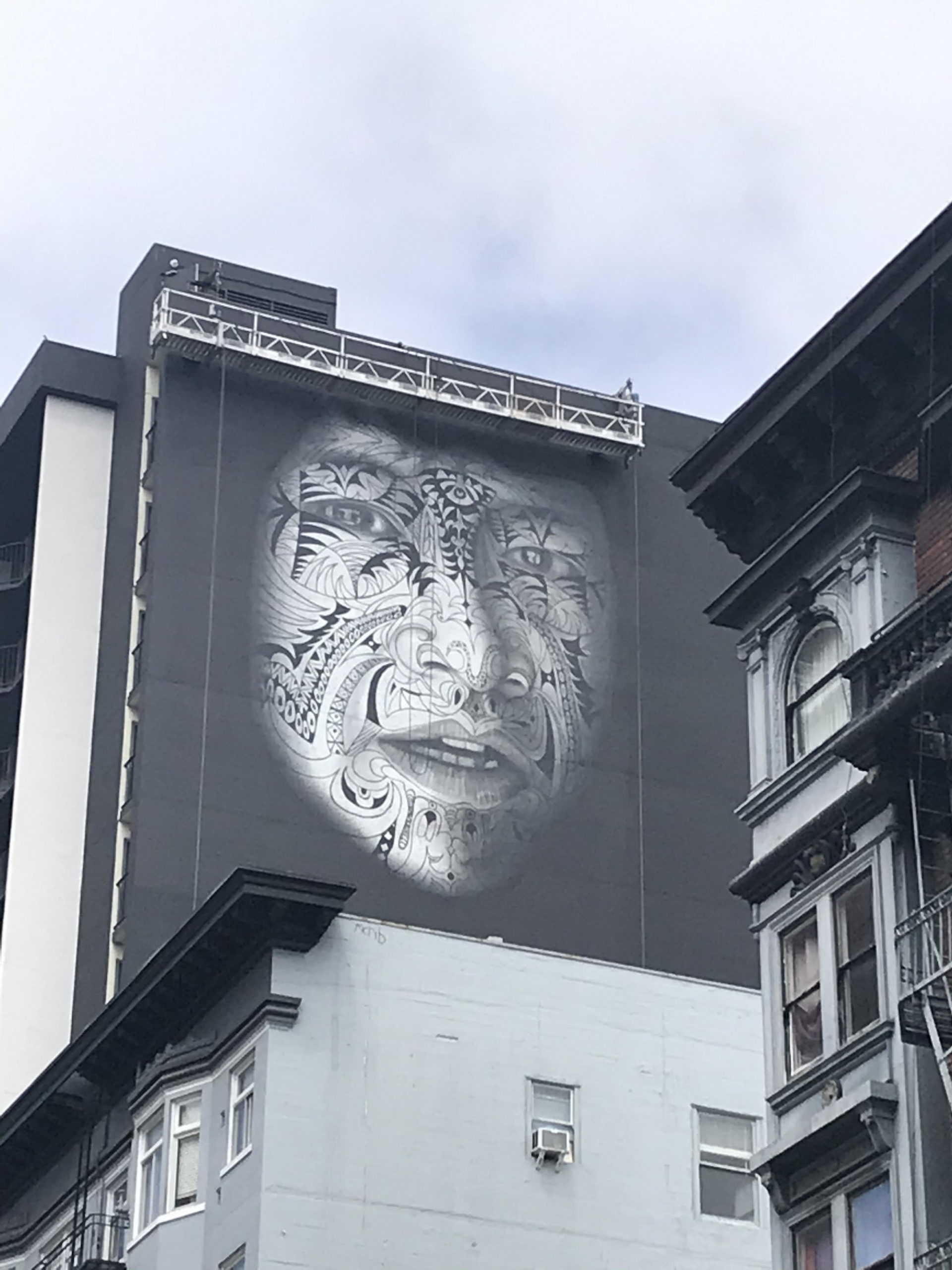 Beautifying the Tenderloin Mosser Towers’ New Mural is a Tribute to a